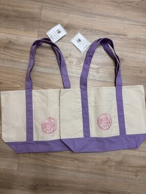 2 large purple Trader Joe’s totes new w tags